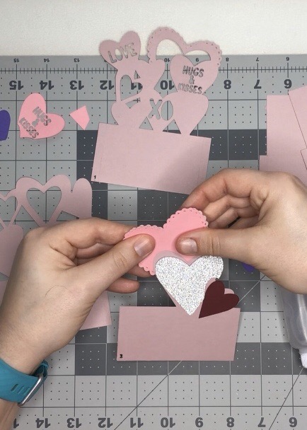 paper piece the hearts to the base