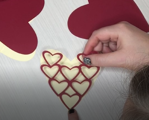 glue the hearts onto the lid